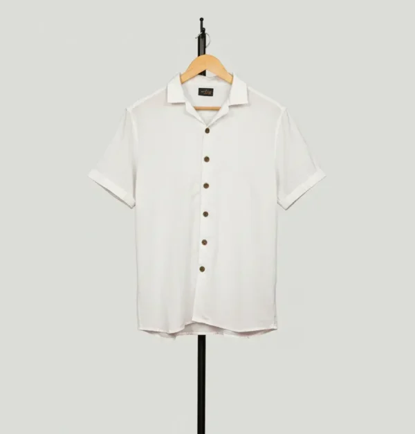 White half sleeve shirt with black button